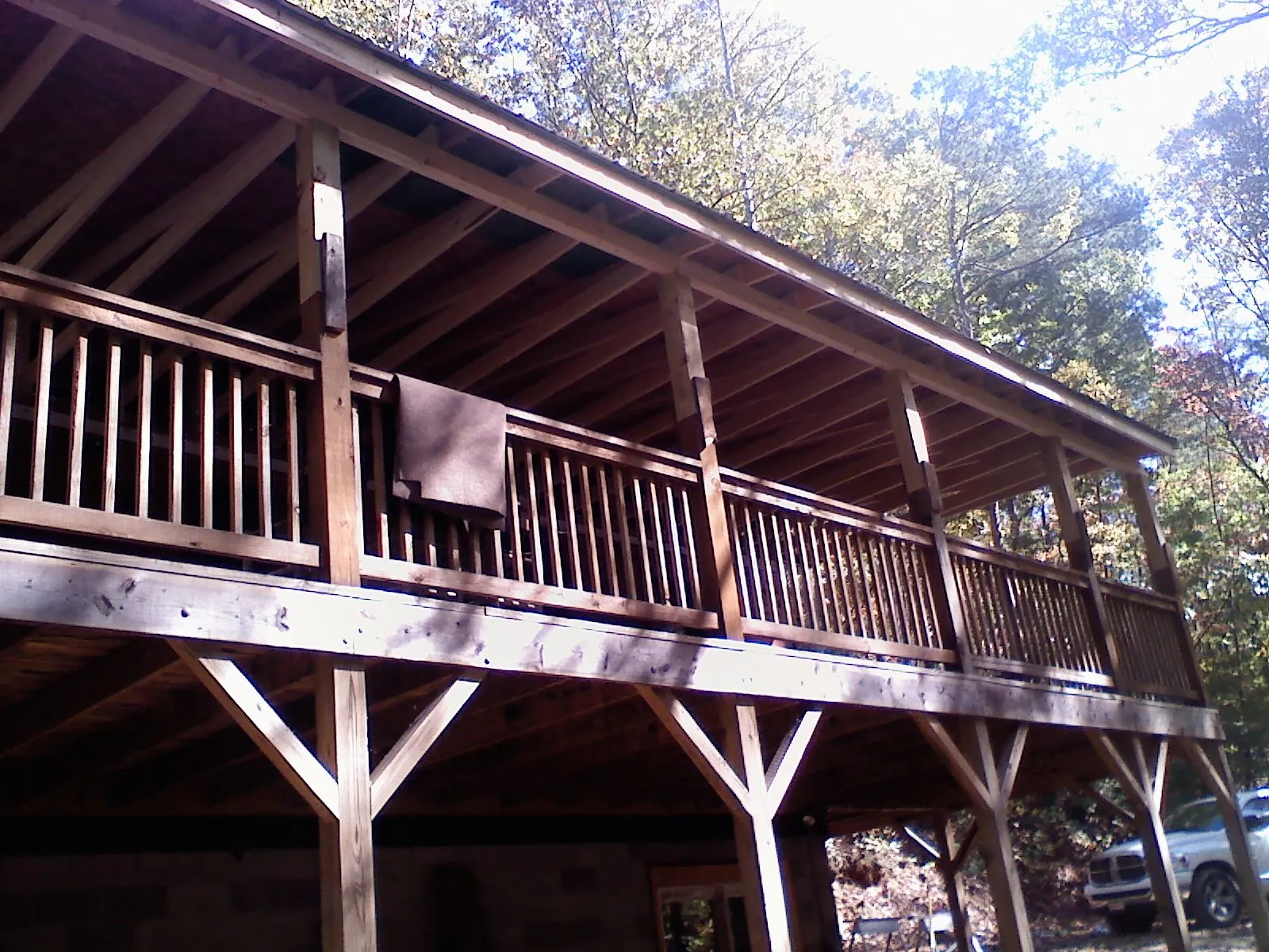 Timber framing under a new elevated porch and deck — Roof Leak Repair in El Campo by Roofing Brothers